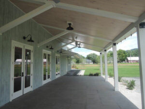 exterior wedding event barn, porch, whitewashed timber, lighting