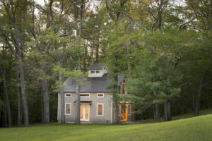 GeoBarns, Massachusetts Woodworking Barn, exterior landscape view, gray siding, lighting