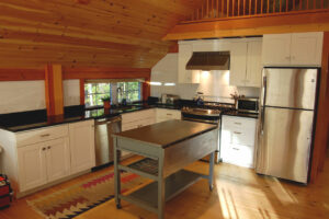 Geobarns, Mountain Carriage House, kitchen interior, stone countertops, cabinetry