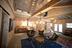 guesthouse, ski house, vermont, interior, barn doors, mezzanine, stair, rustic modern