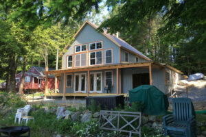 Geobarns, Lake House and Barn, exterior porch, windows, lake view