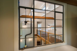 family home, interior, timber, modern rustic, mezzanine office, industrial window, view to below
