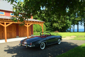 Geobarns, Lake Erie Auto Barn, porch barn doors, landscape view