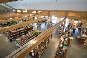 GeoBarns, Waterfresh Farm Market, interior timber beams, lighting, retail experience