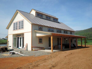 Geobarns, Holy Cross Anglican Church in Virginia, exterior porch and entry, cupola, white barn, natural fir trim