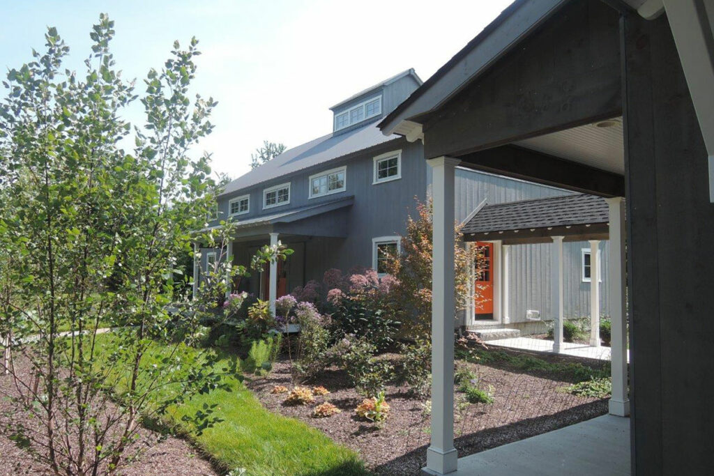 A Geobarns Forever Home featuring a natural garden, designed and built by Geobarns.