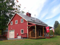 shop, exterior, red barn, woodworking, garage doors, porch, landscape