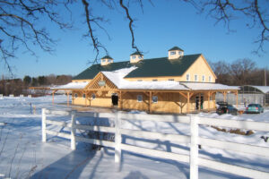 Commercial retail nursery, exterior snow, modern barn, framing, wraparound porches