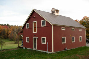 shop, exterior, red barn, woodworking, barn doors, porch, landscape