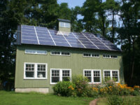 green barn, exterior, passive solar, artist studio, solar panels, garden