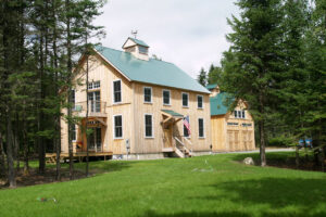 barn home, exterior, kitchen, modern, rustic, timber, beams, lighting, stone countertop, cabintetry