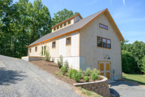 wood shop barn door hillside bank