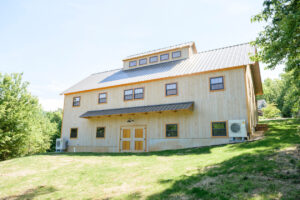 wood shop barn door hillside landscape bank