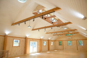 barn interior beams lighting daylight airy