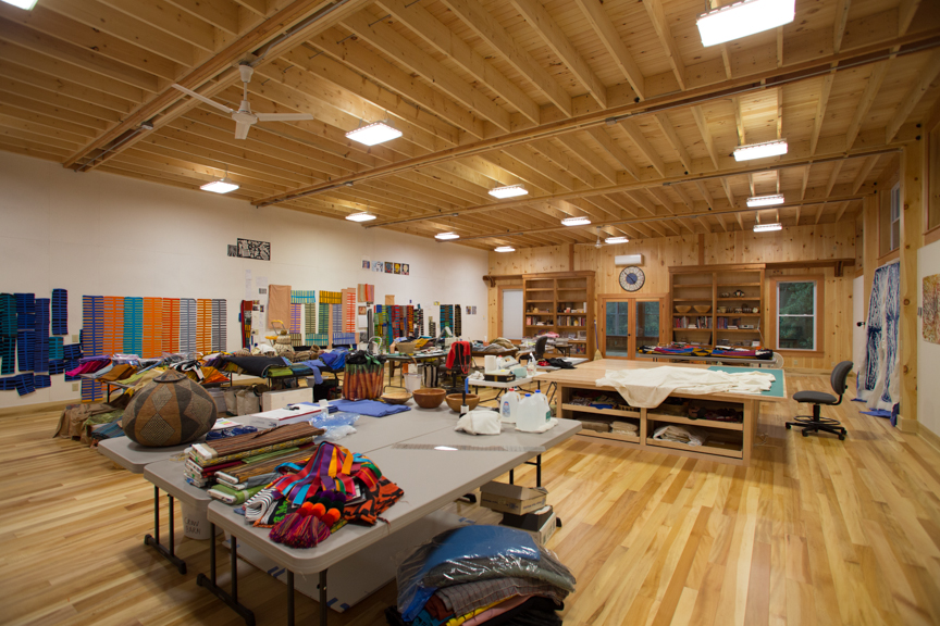 An interior picture of Nancy Crow's quilting studio, design and built by Geobarns