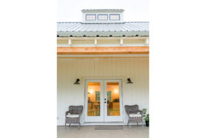 Geobarns, Shenandoah Modern Farmhouse Exterior with white siding, metal roof, and front porch