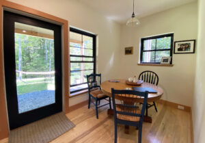 Geobarns, Forest Glade Home, NH, Dining Nook, Glass Door, Wood Floor