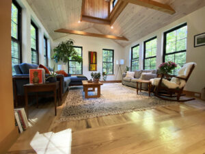 Geobarns, Forest Glade Home, NH, Living Room, Vaulted Ceiling, Wood Ceiling, Wood Floor, Cupola
