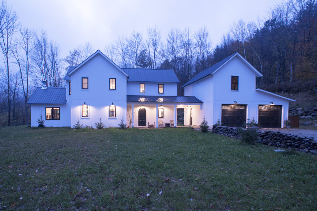 Geobarns; New England Modern Farmhouse; VT; White Siding; Metal Roof