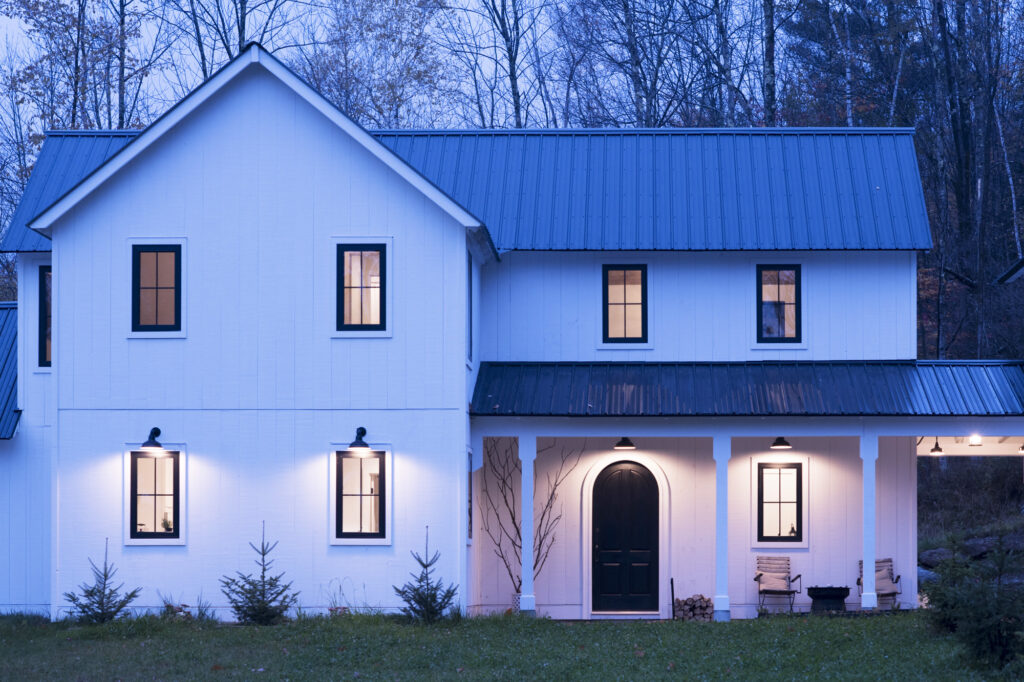 Geobarns; New England Modern Farmhouse; VT; White Siding; Metal Roof