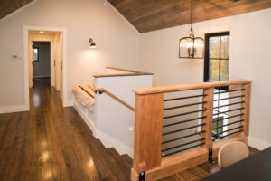 Geobarns; New England Modern Farmhouse; VT; Reading Loft; Reading Nook; Metal Bannister