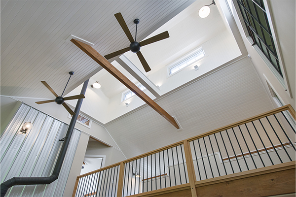 An interior picture of the mezzanine and cupola of a Geobarns Forever Home, designed and built by Geobarns.