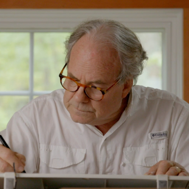 Geobarns founder and CEO George Abetti works on a Geobarns design