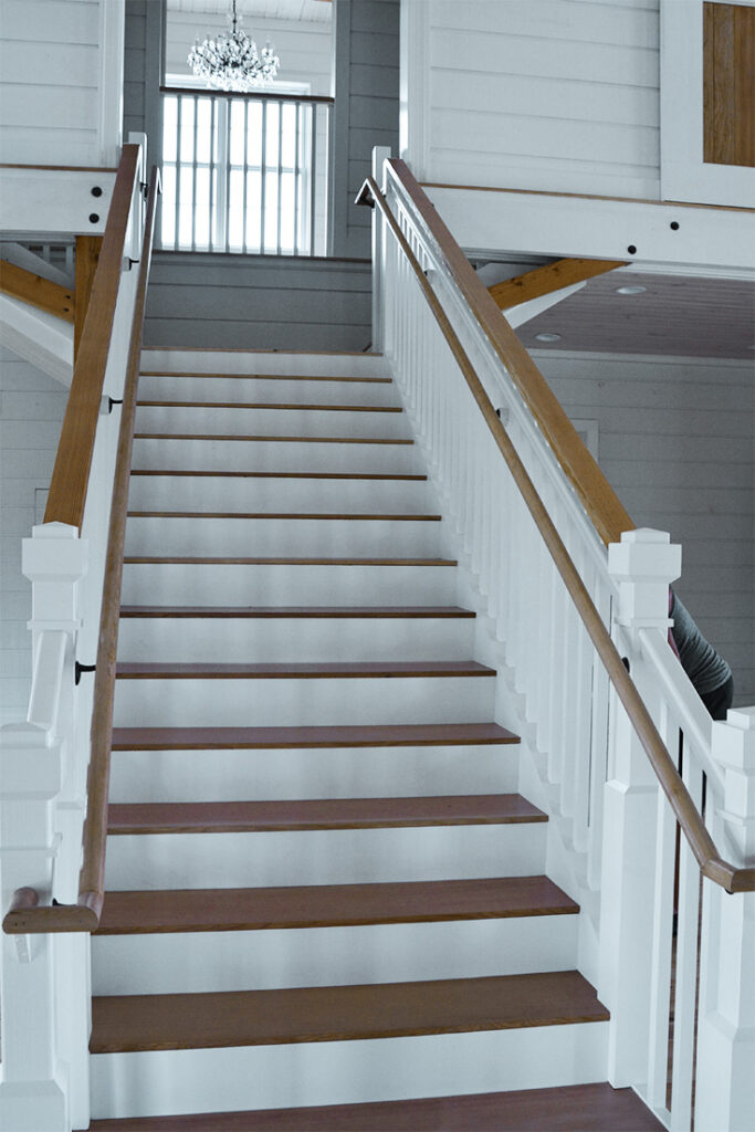 The grand staircase at the Barn at Smugggler's Notch, leading to the private bridal suite. Designed and built by Geobarns